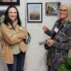 Rebecca Benford and Gillian Hurt with their works displayed behind them