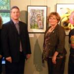 Diane Safko, Show chair stands with Troy Van Scoyoc - Chief Administrator-Defense & Veterans Brain Injury Center Debbie DeBiase - Administrative Assistant-DVBIC, and Bob Hovanec, co chair of the exhibition. DVBIC received art donated by the artists through our Friends of Art program.